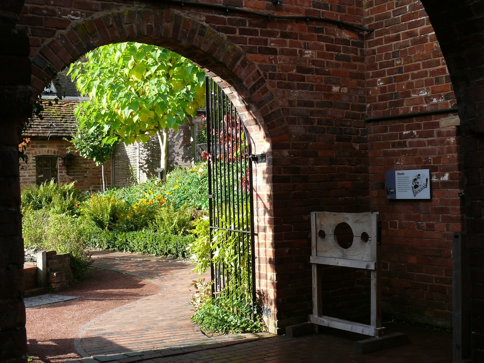 Herb garden through archway