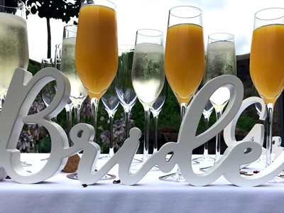 Cut out word Bride on drinks table