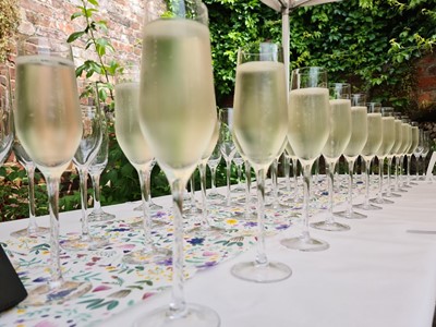 Glasses of fizz on table